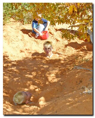 Kids in the sand at the Coral Pink Sand Dunes