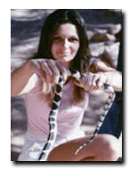 Mary Cisneros holding a Common King Snake
